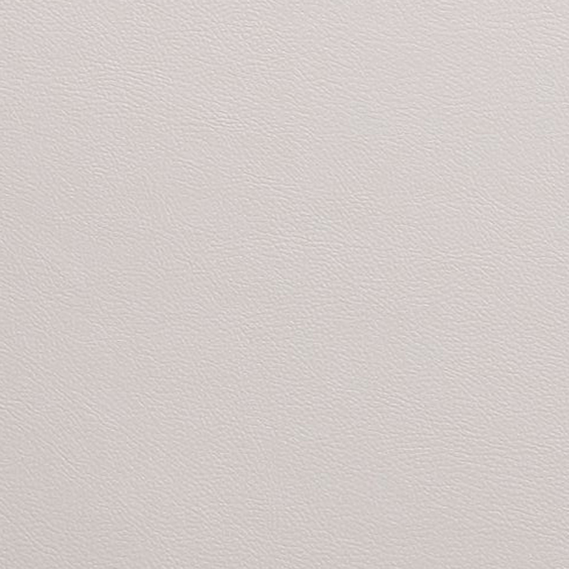 Closeup of textured light grey vegan leather fabric for upholstery
