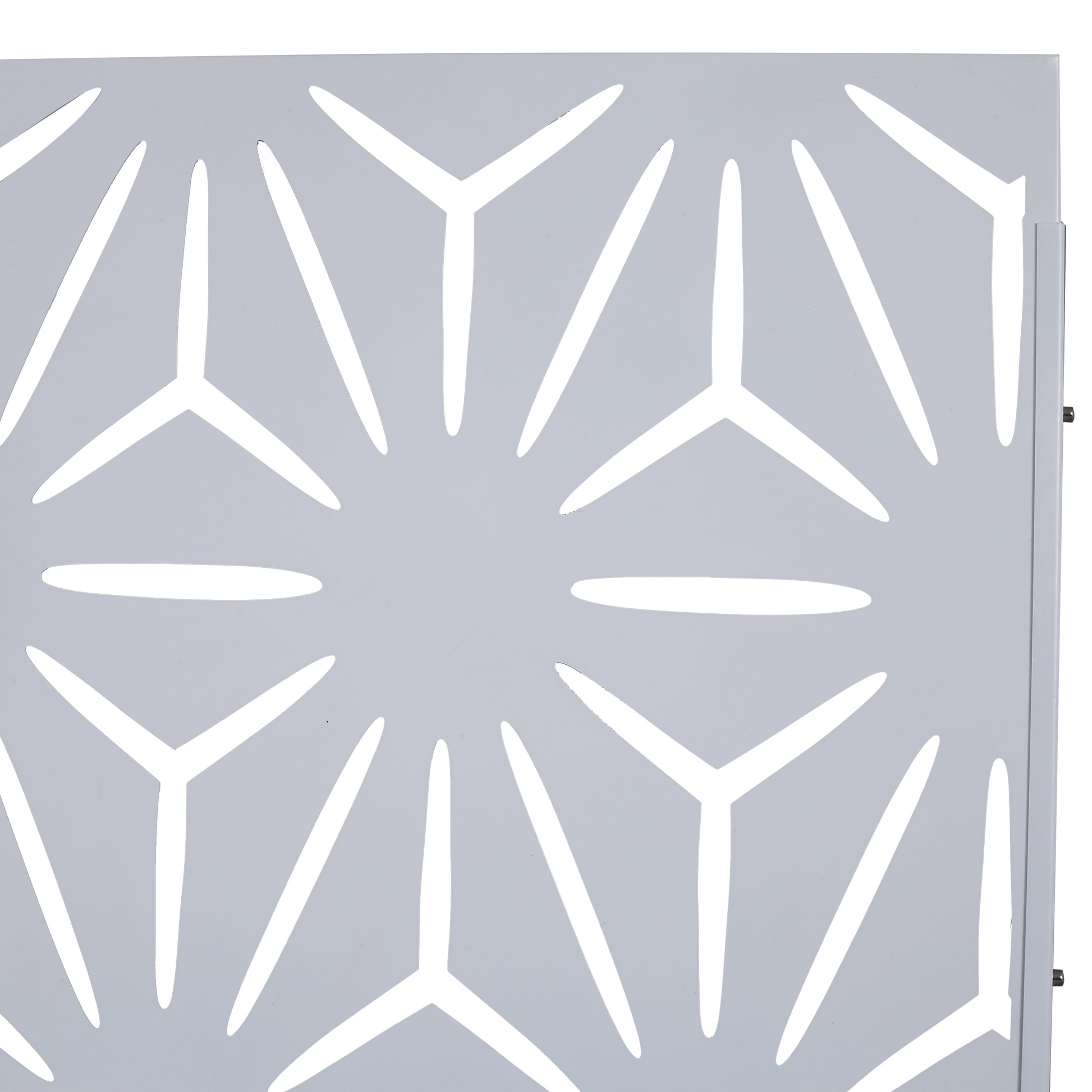 Light gray metal privacy screen with a geometric starburst pattern