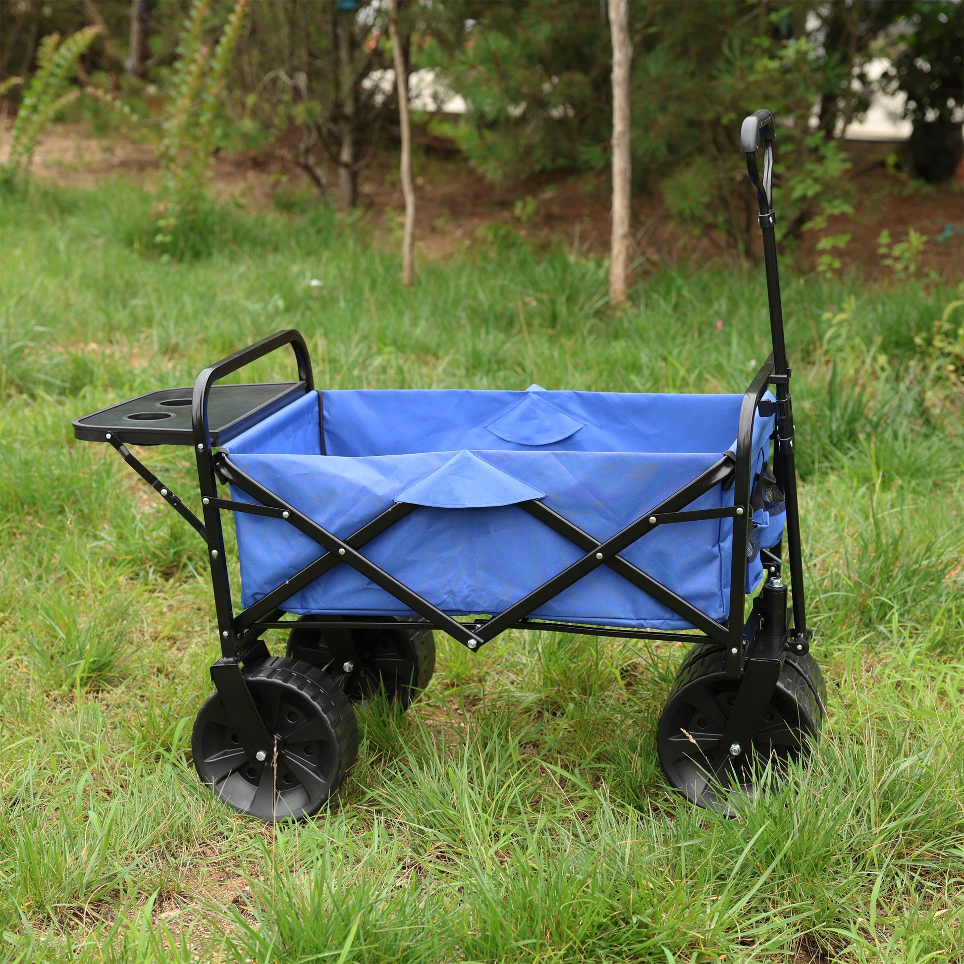 Blue collapsible garden wagon with cup holders on a detachable tray