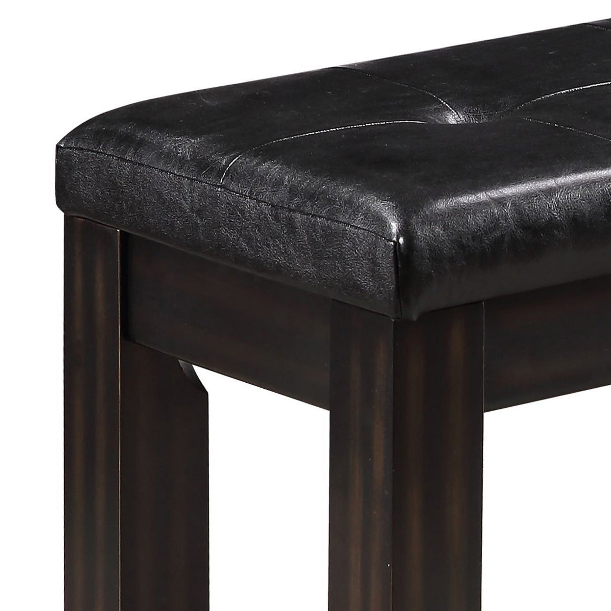Dark brown faux leather upholstered bench with tufted seat and wooden legs