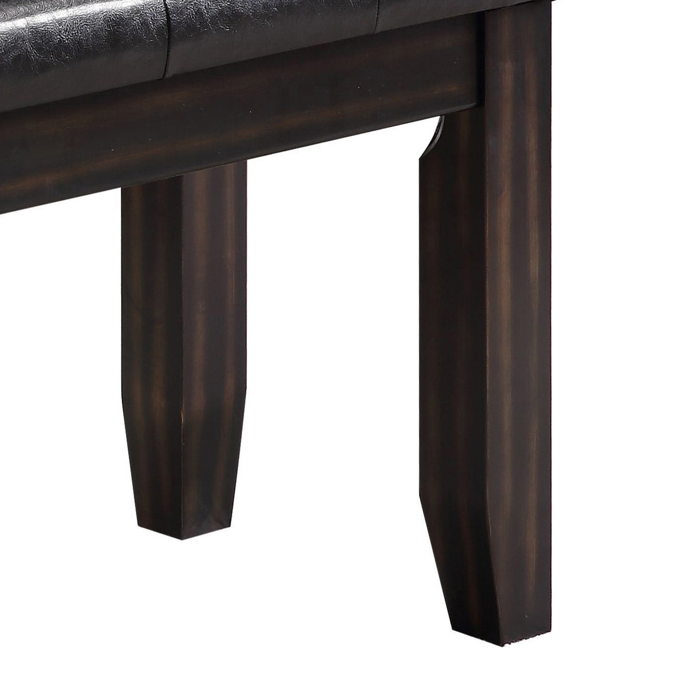 Closeup of dark brown wooden tapered bench legs with a distressed finish