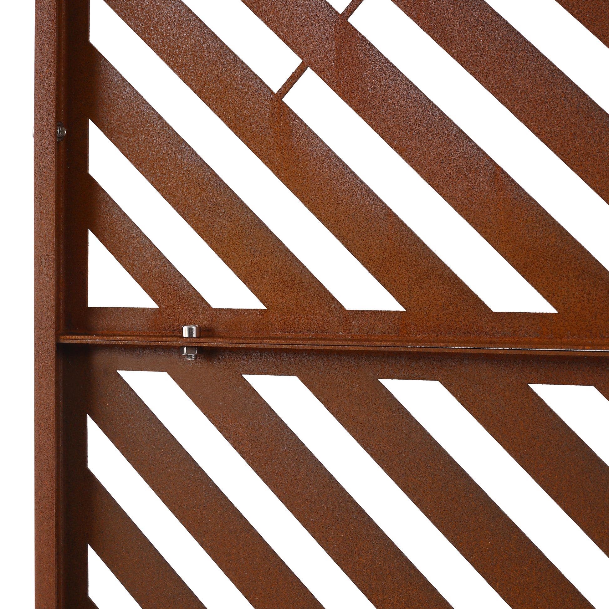 Closeup of a rusted metal garden screen with diagonal slats