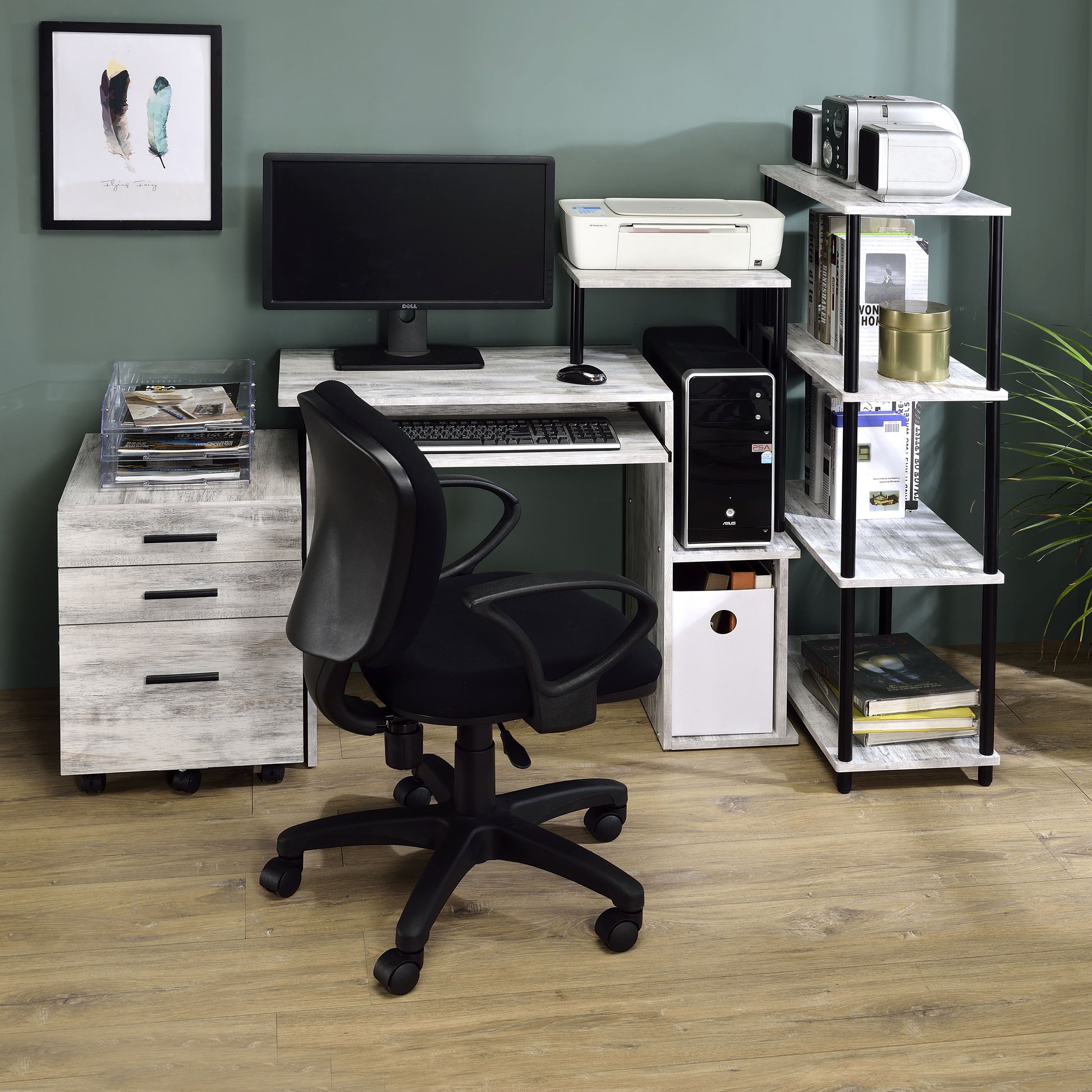 Wooden home office desk with black chair and computer setup