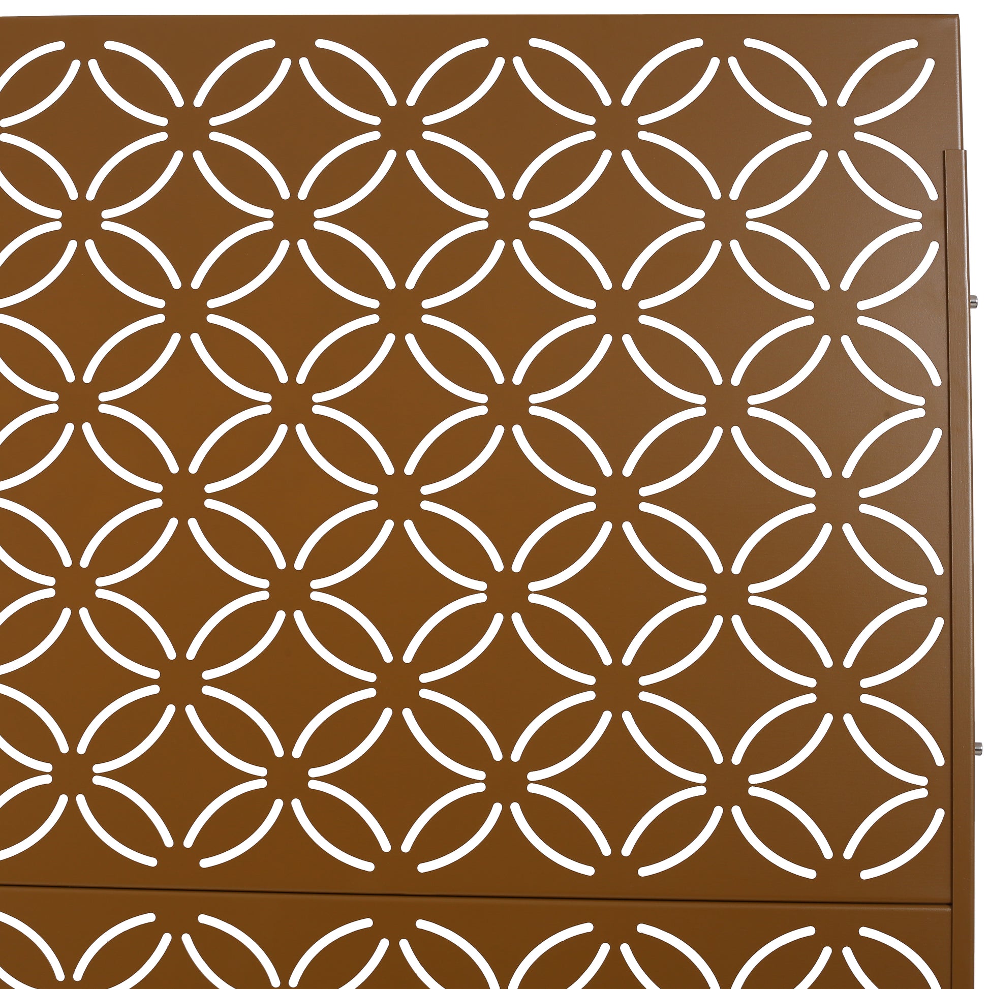 Brown metal decorative panel with a repeating geometric quatrefoil cutout pattern
