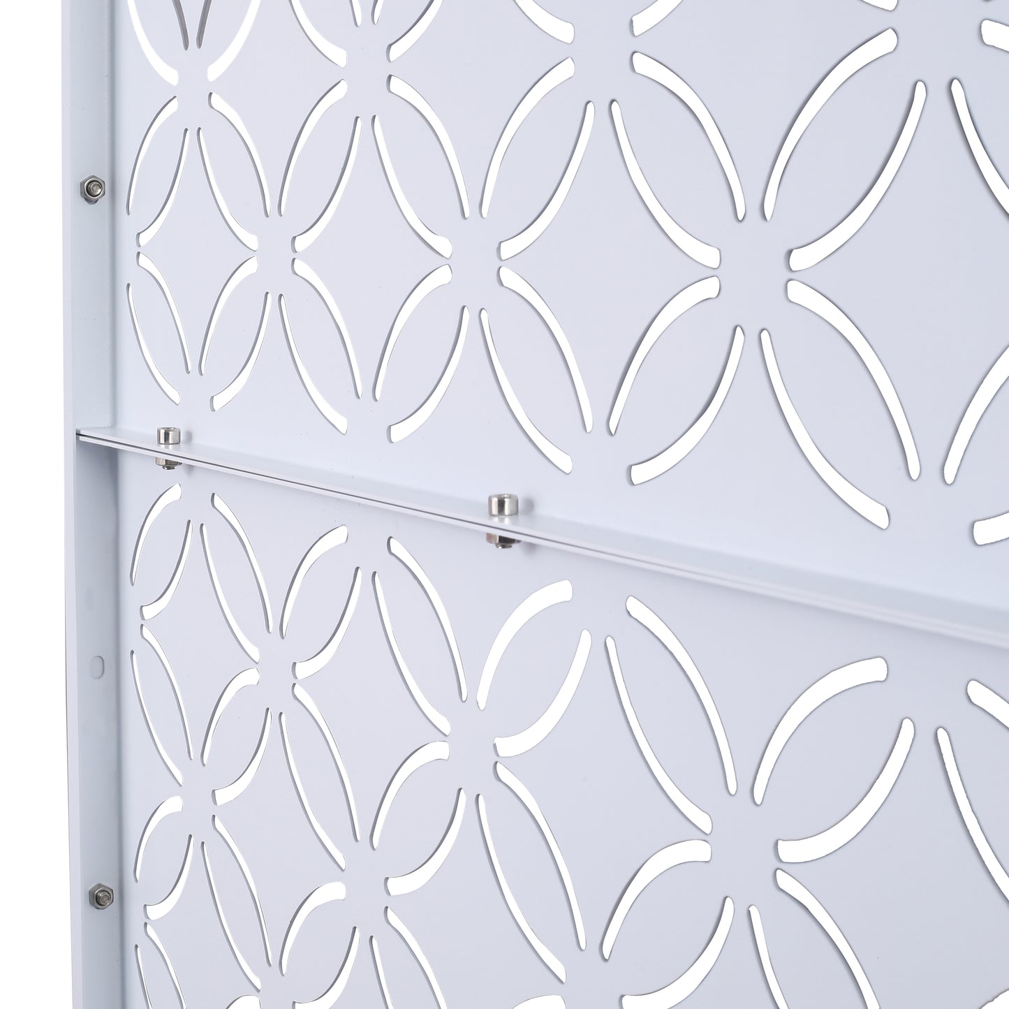 White perforated metal panel with a floral cutout pattern