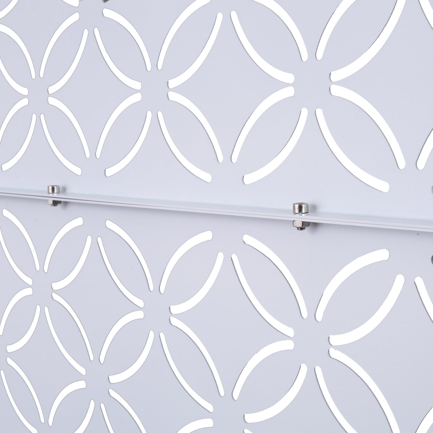 White metal decorative screen with overlapping circular cutout pattern