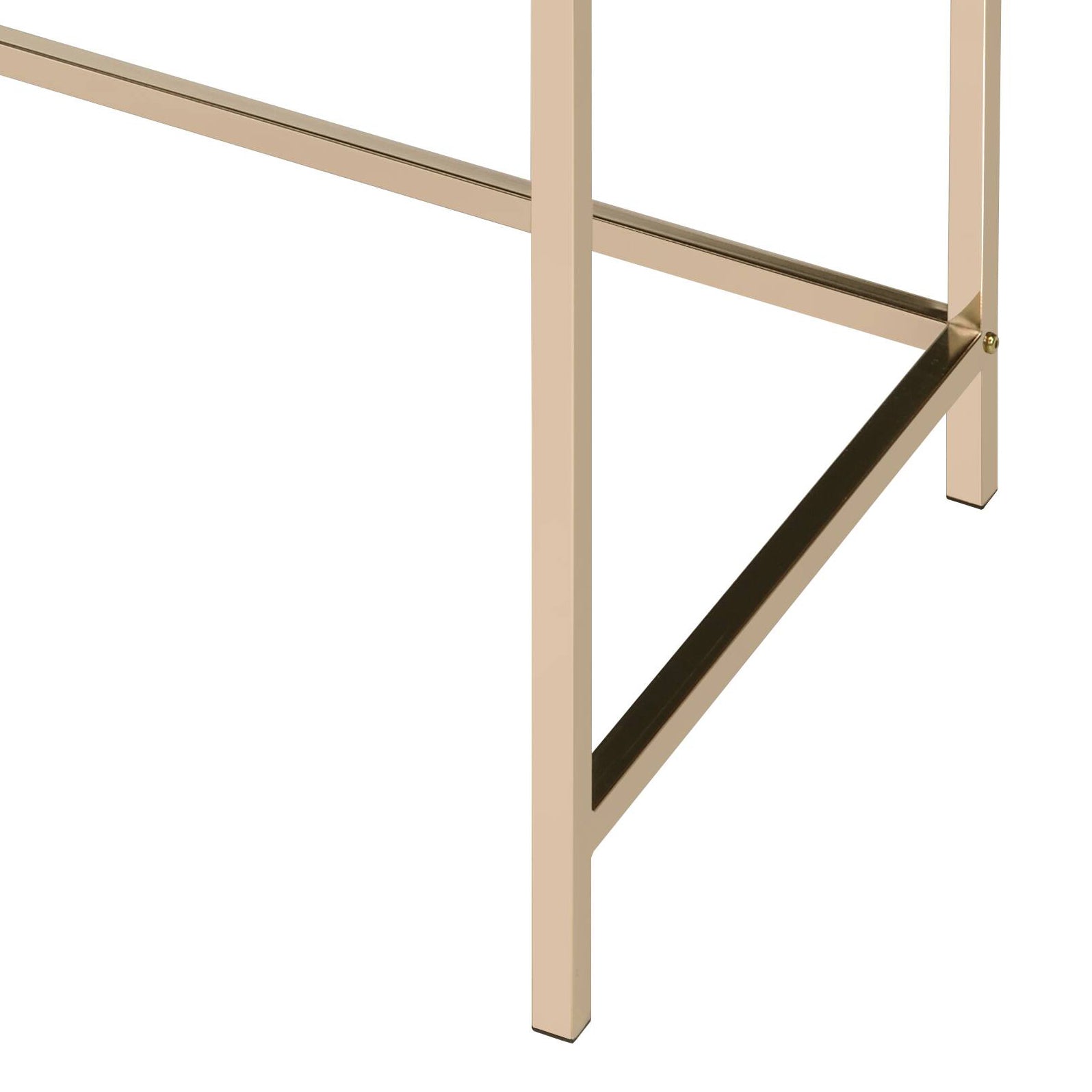 Closeup of brass metal table legs with clean lines and a modern design