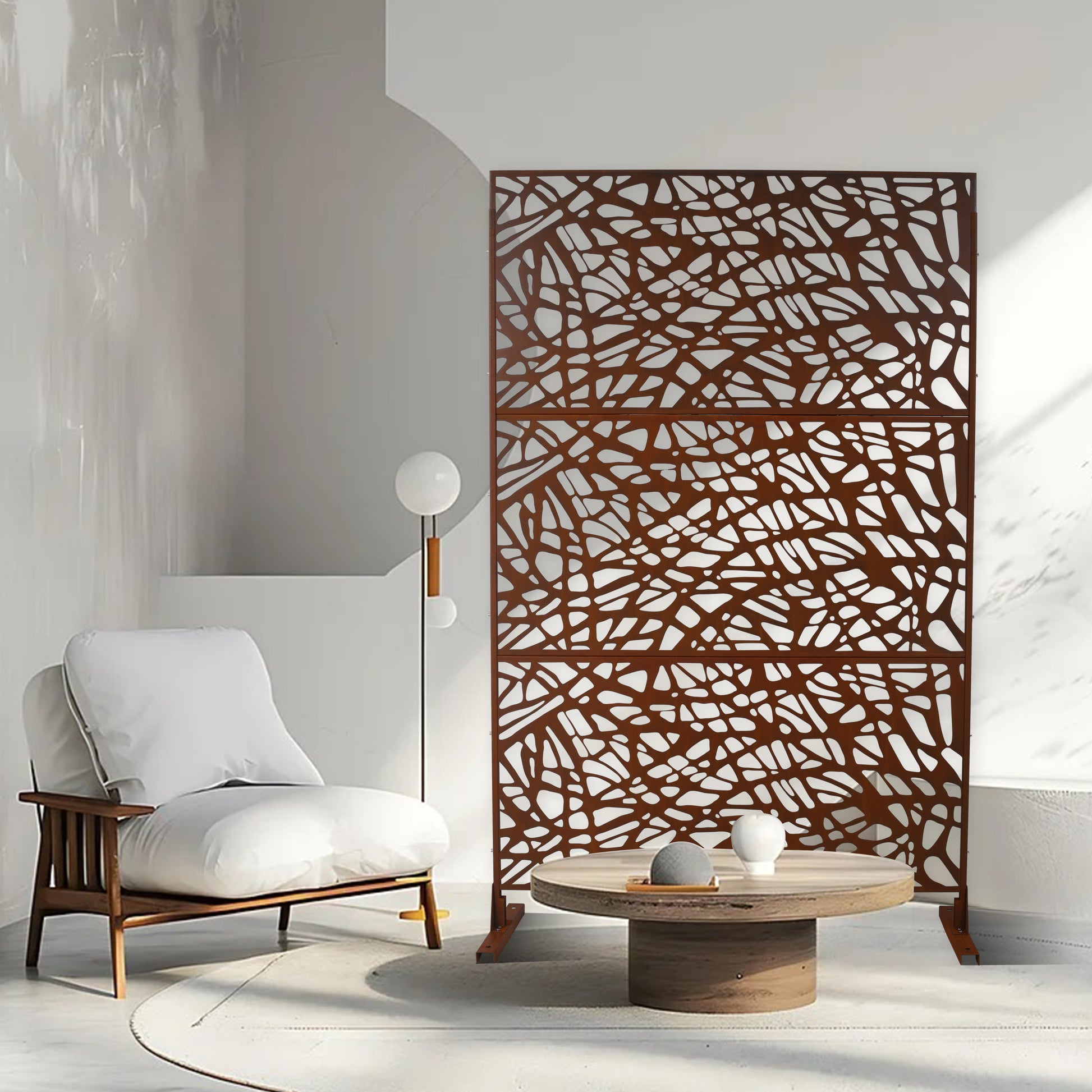 Decorative metal room divider with organic branch pattern in rust finish