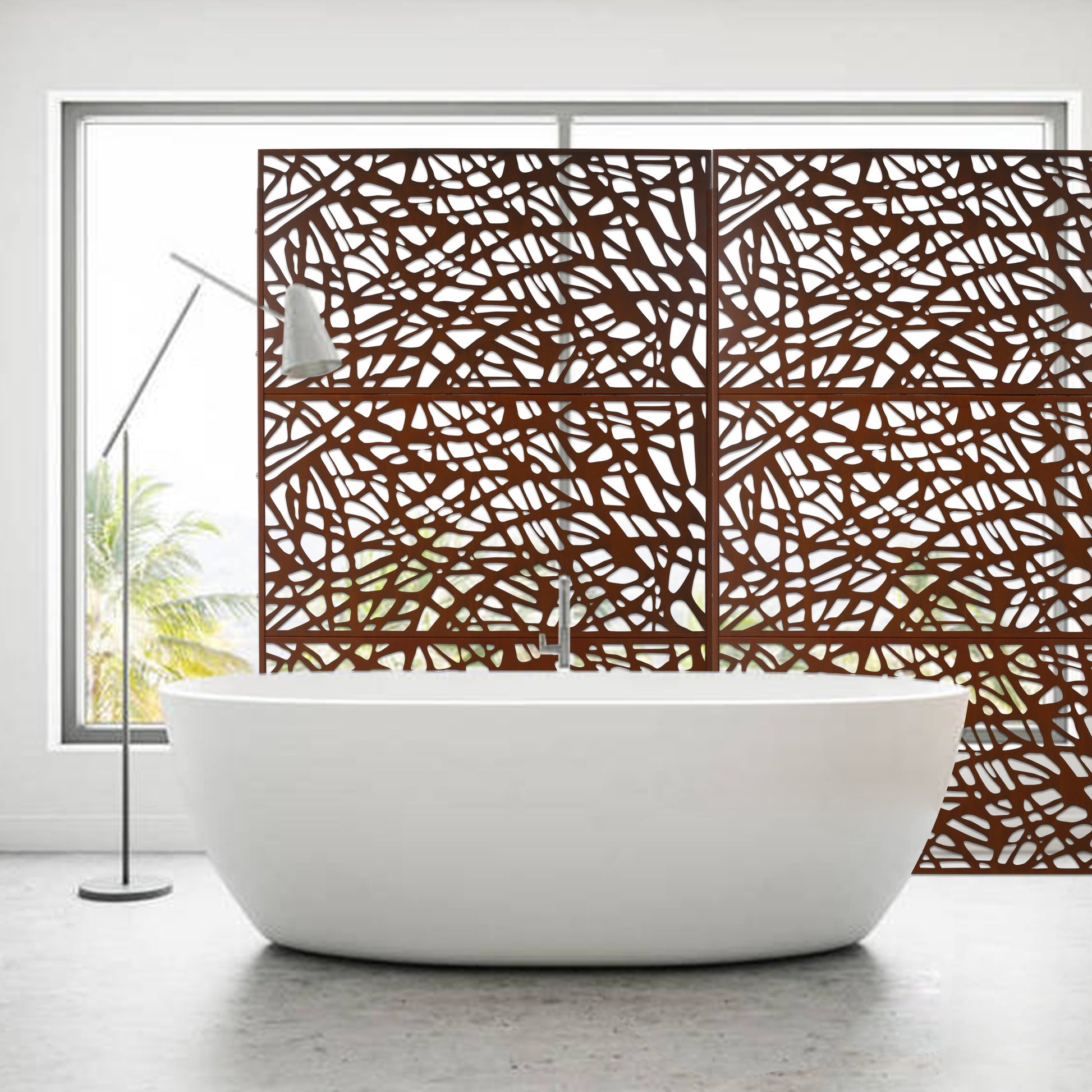 Decorative metal screen with intricate vine pattern in rust finish for modern interior design