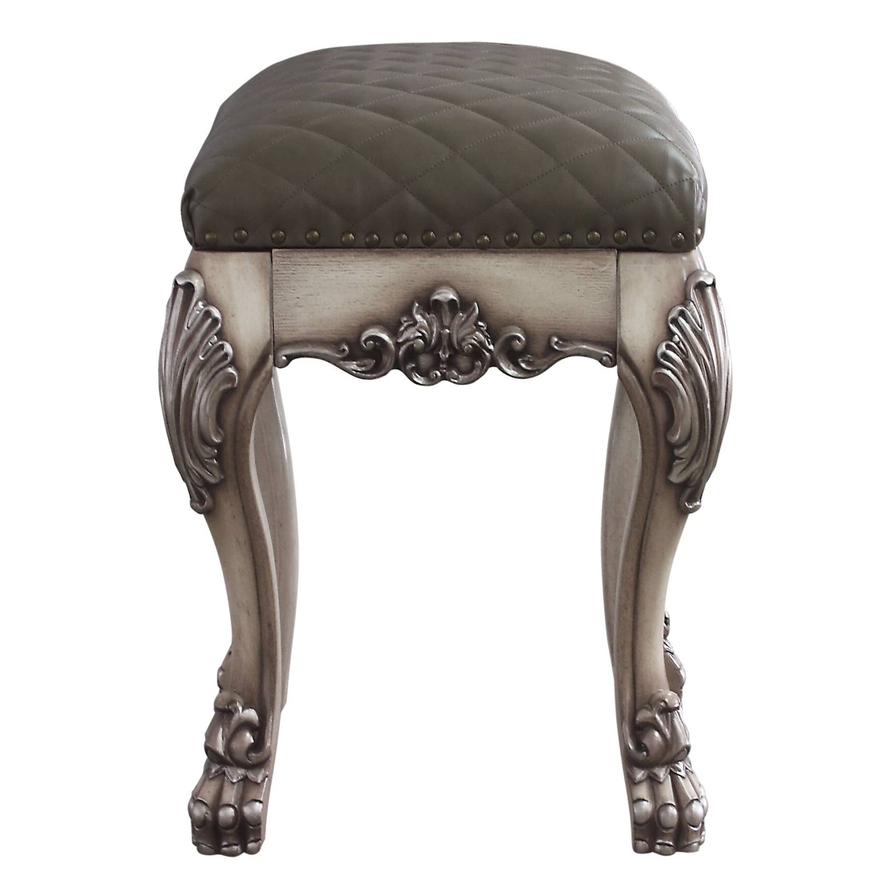 Quilted dark grey leather vanity stool with ornate carved wooden legs and brass nailhead trim