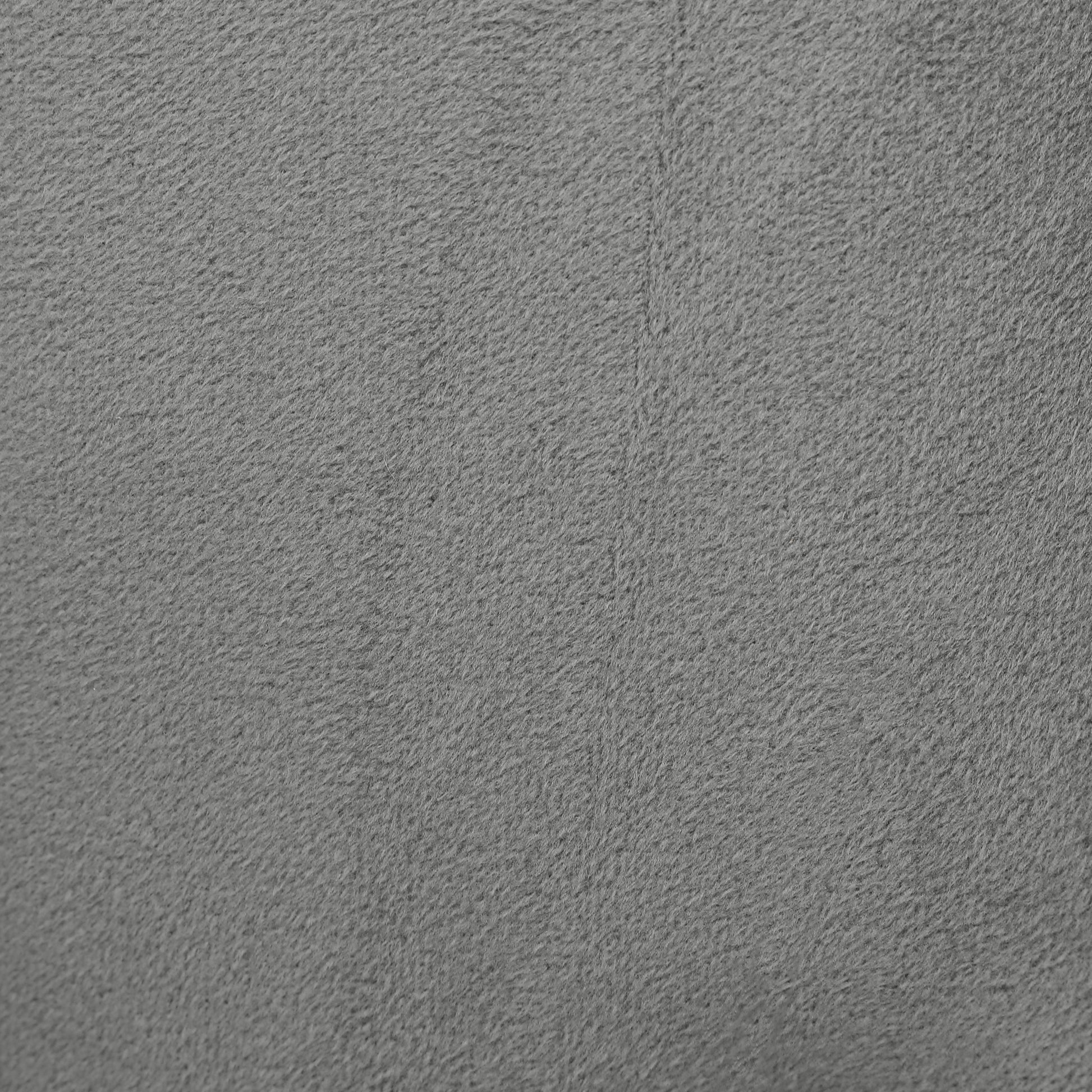 Closeup of textured grey microfiber fabric ideal for upholstery and blankets
