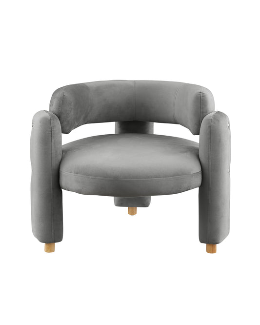 Grey velvet accent chair with rounded arms and natural wood legs