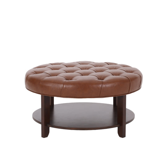 Round brown leather tufted ottoman with dark wood base
