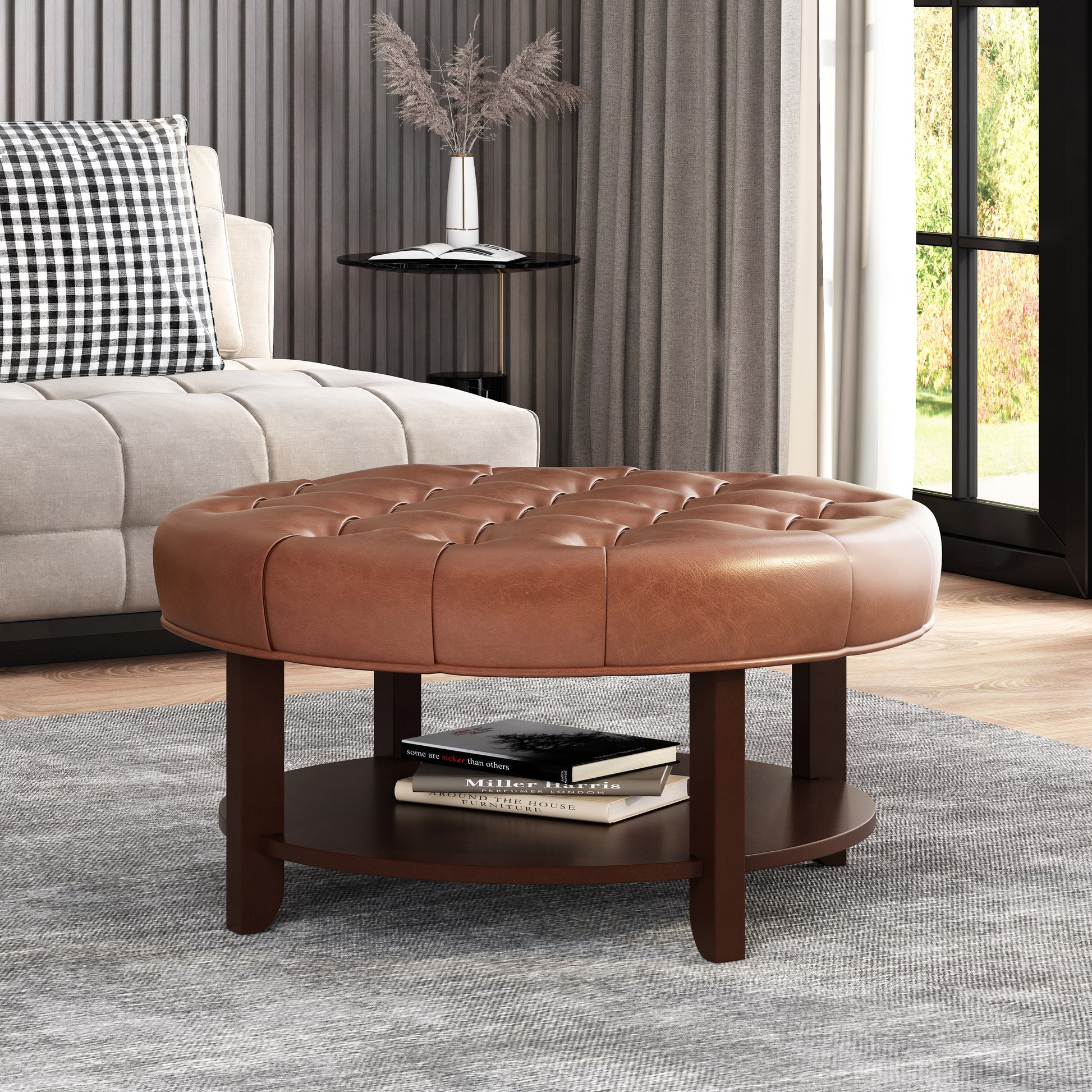 Tufted brown leather ottoman with dark wood legs and a lower shelf