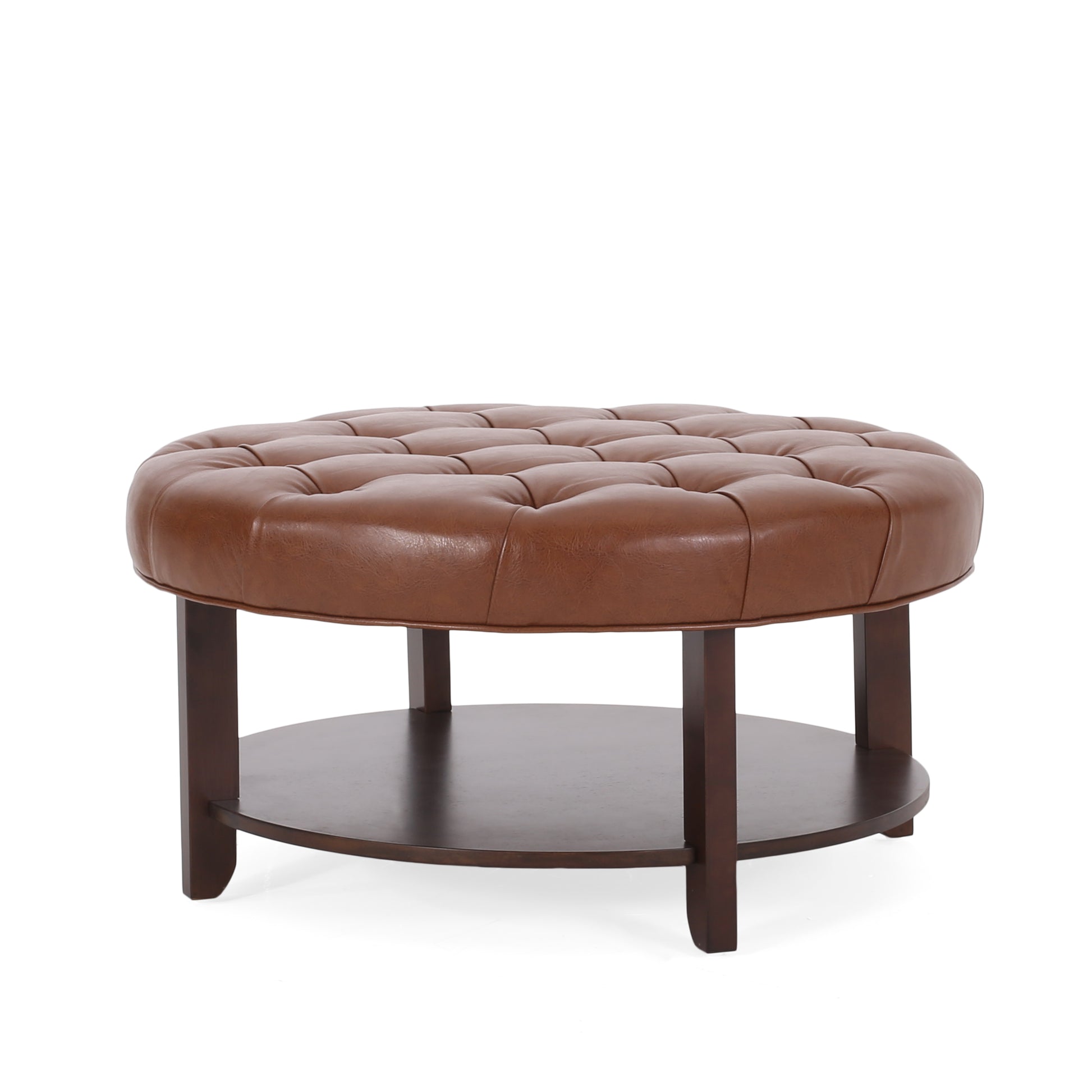 Tufted brown leather round ottoman with dark wood legs and shelf