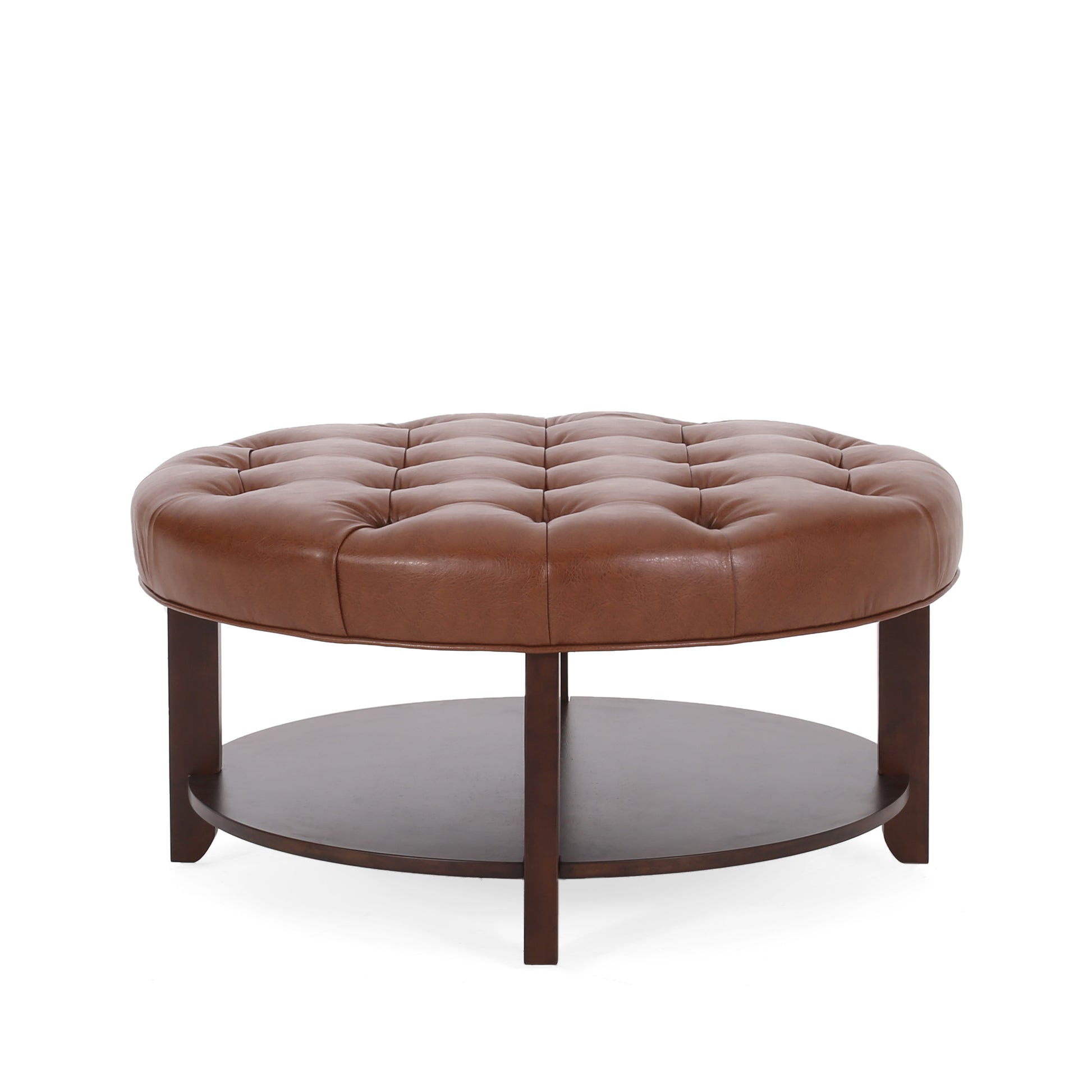 Round brown faux leather tufted ottoman with dark wood base