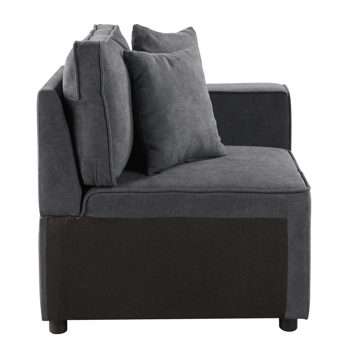 Dark gray fabric sectional sofa corner piece with two lumbar pillows