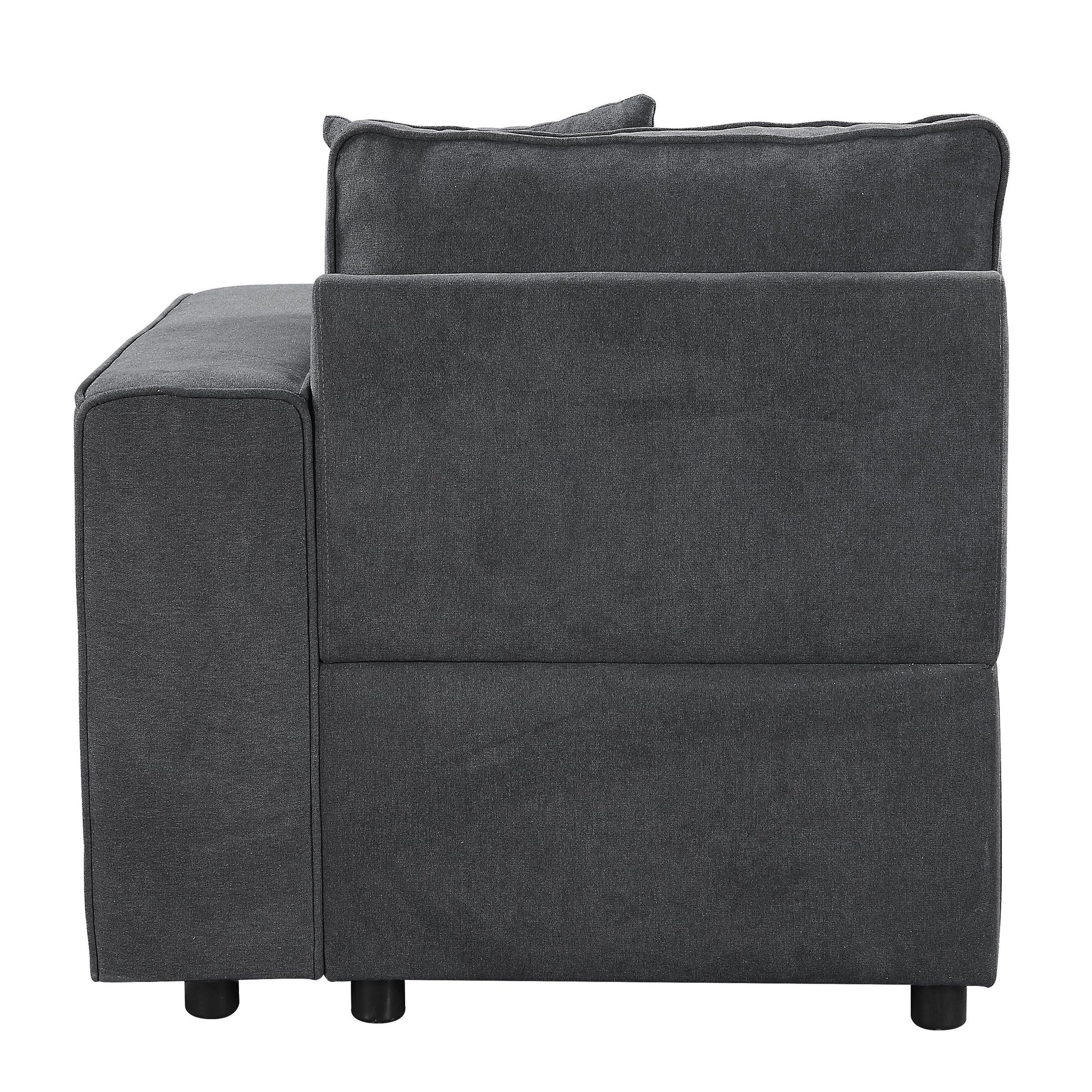 Dark gray upholstered modern sofa armrest with tufted details for living room comfort