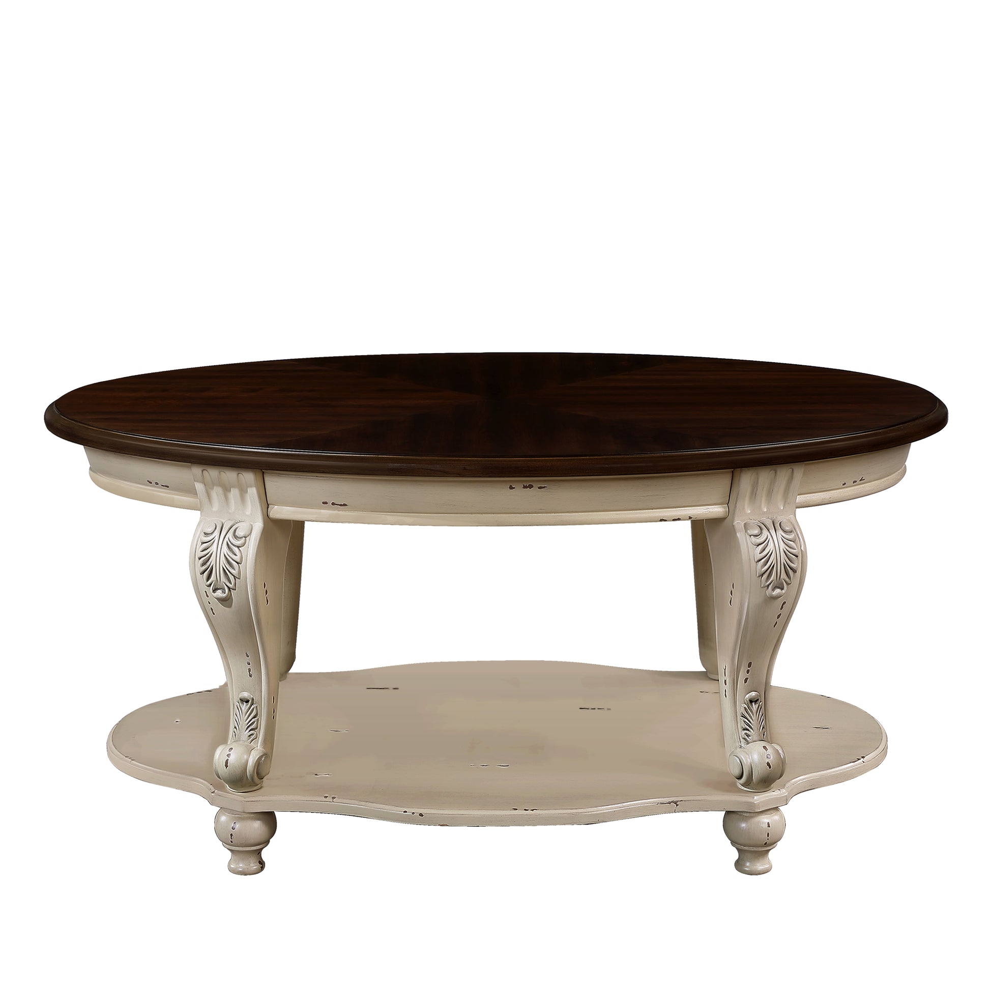 Distressed cream oval coffee table with dark wood top and carved legs