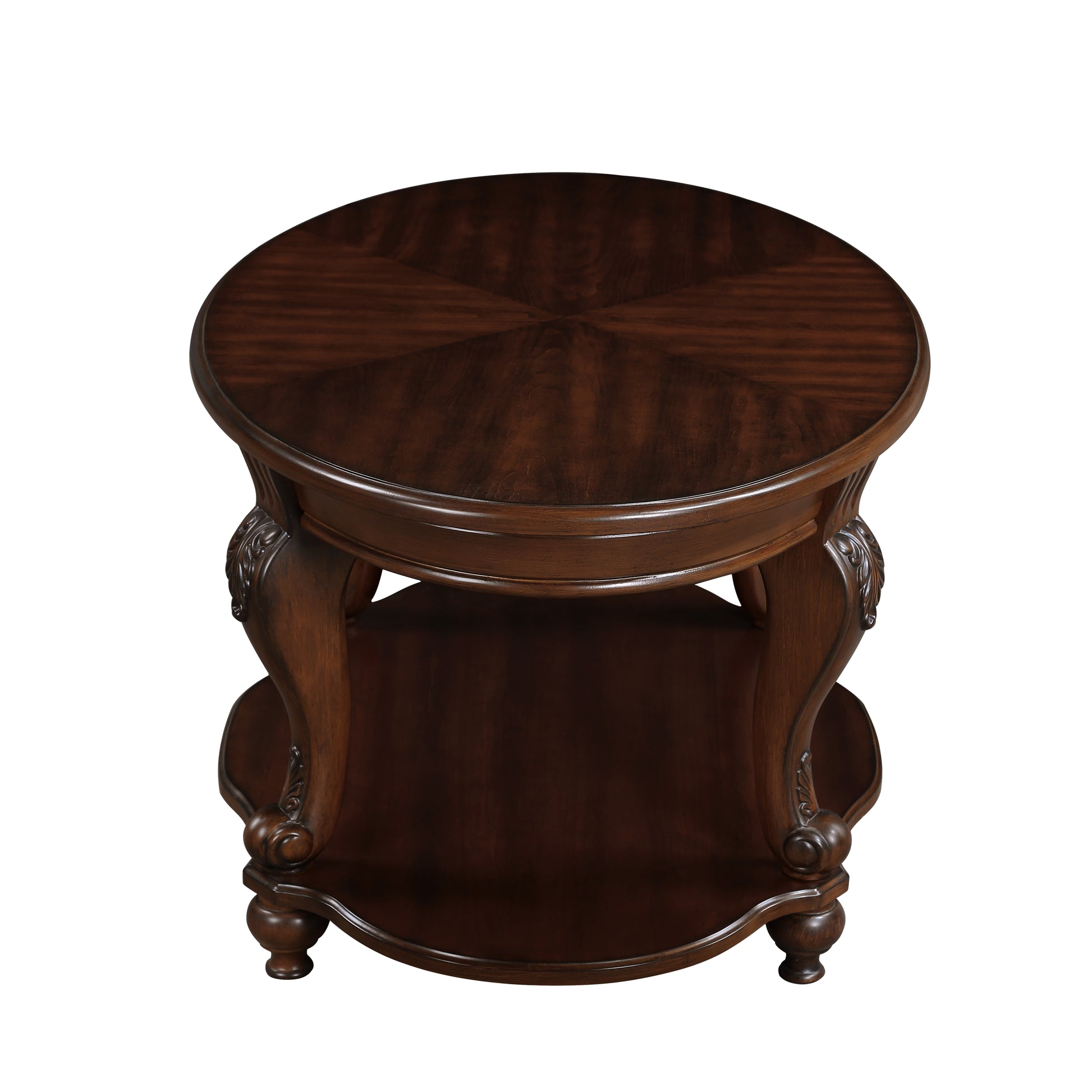 Ornate dark wood round end table with carved legs and shelf