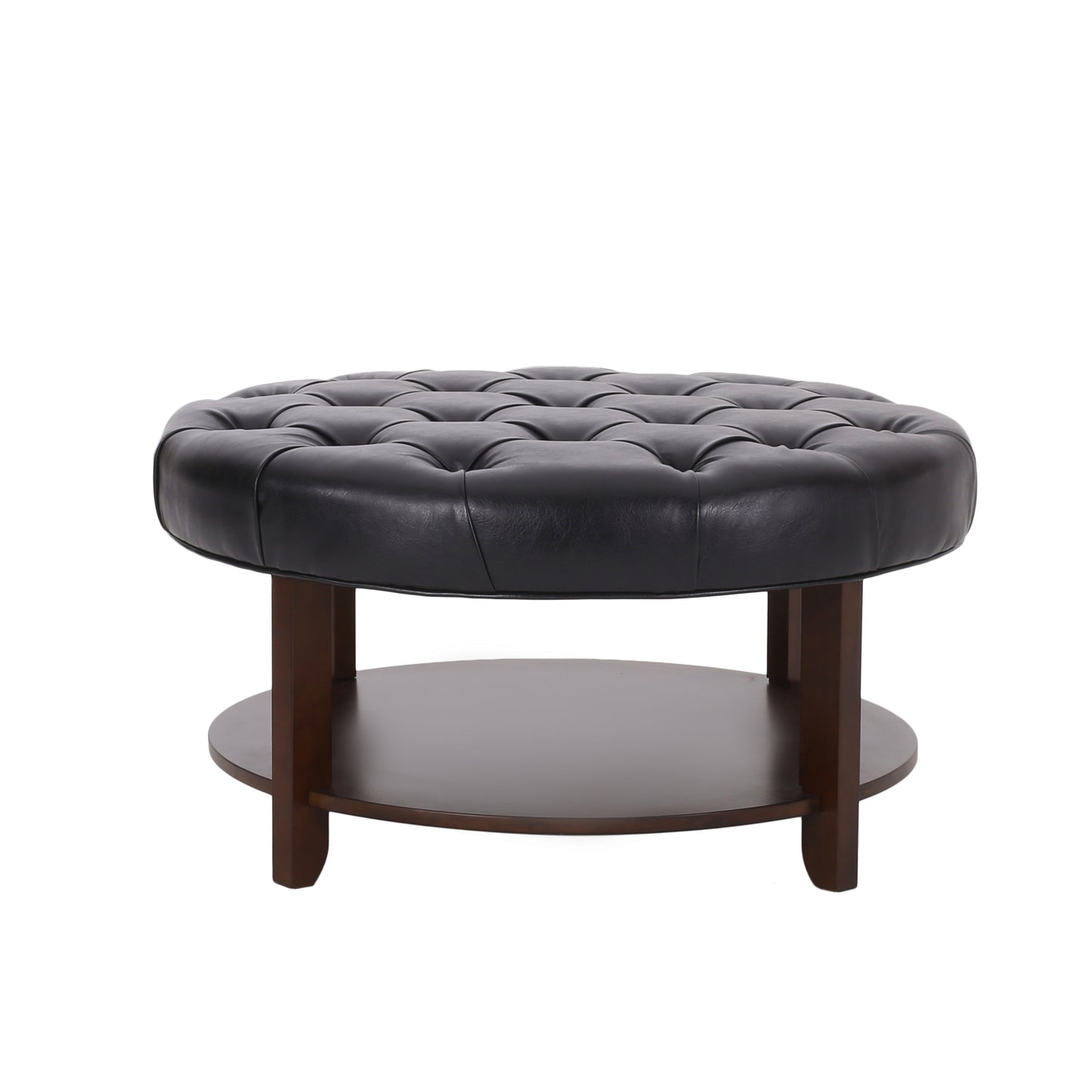 Black leather tufted round ottoman with dark wood base