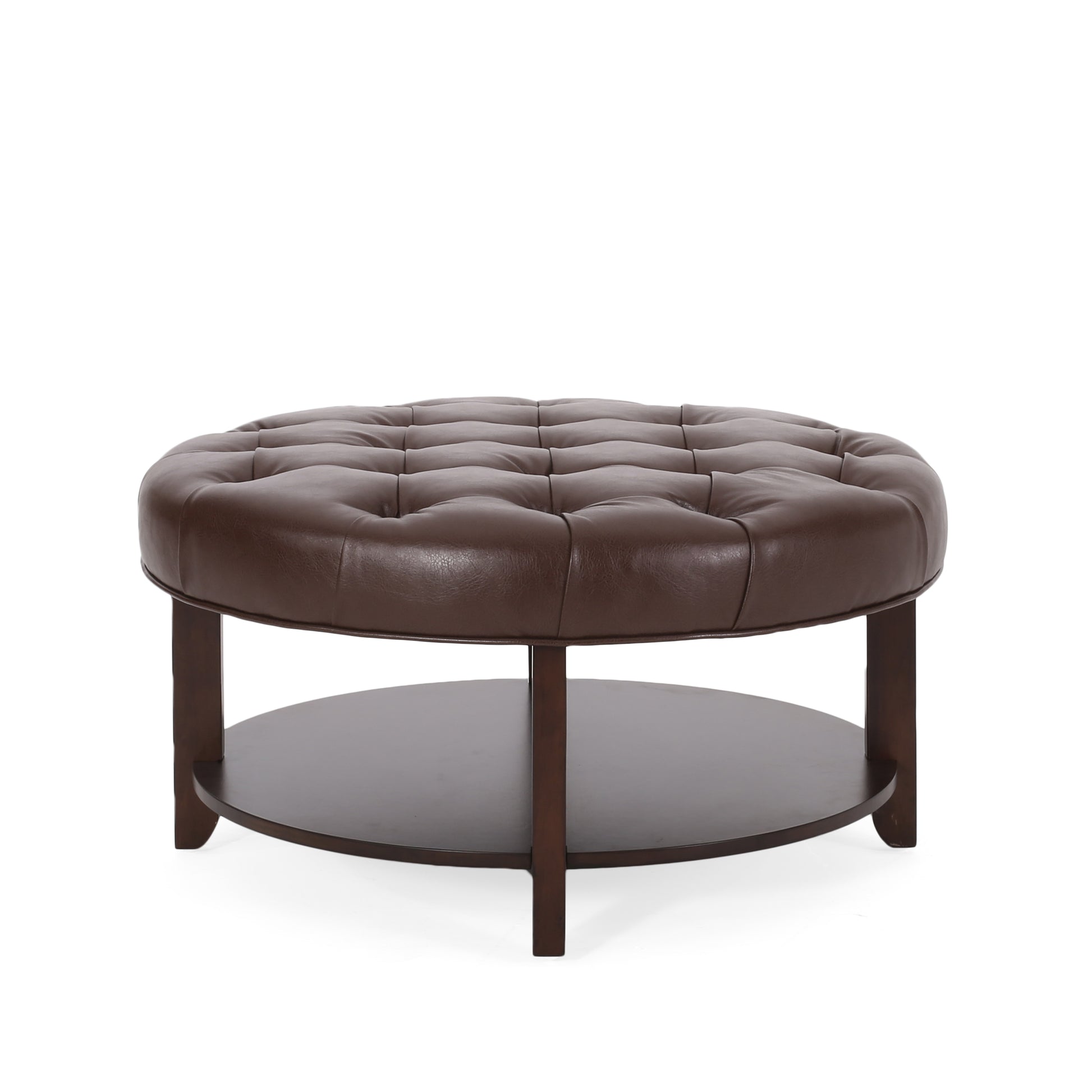 Brown tufted leather ottoman with a round dark wood shelf