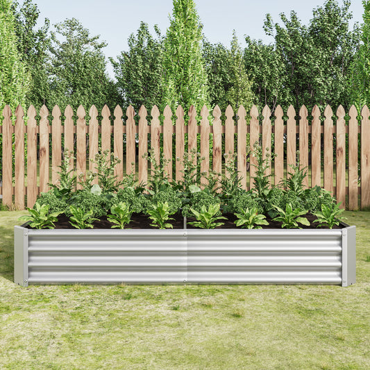 Silver corrugated metal raised garden bed with lush green plants growing
