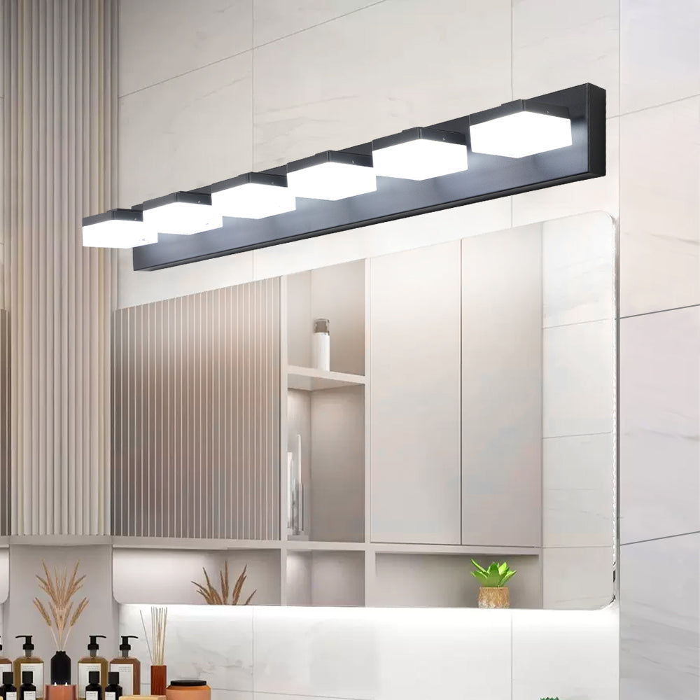 Modern black vanity light fixture with five square frosted glass shades above a bathroom mirror