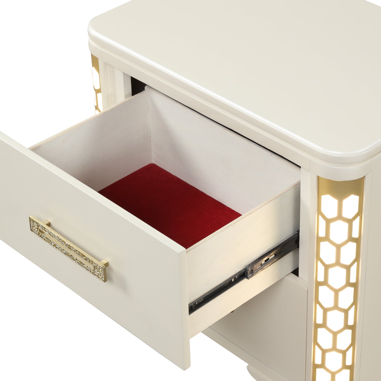 Cream modern bedside table with embellished gold handle and open drawer lined with red velvet