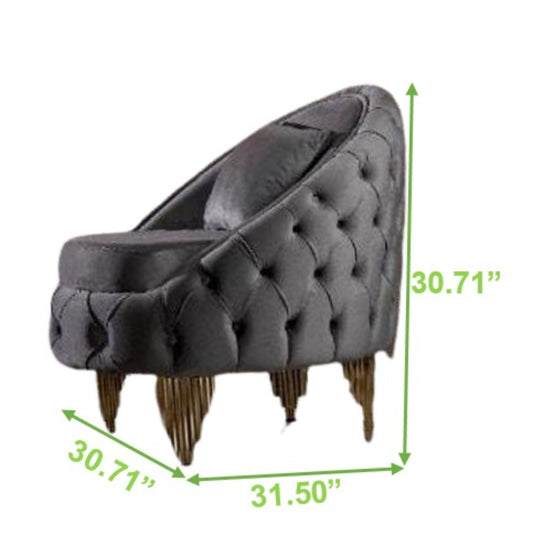Dark gray velvet accent chair with tufted back and gold legs