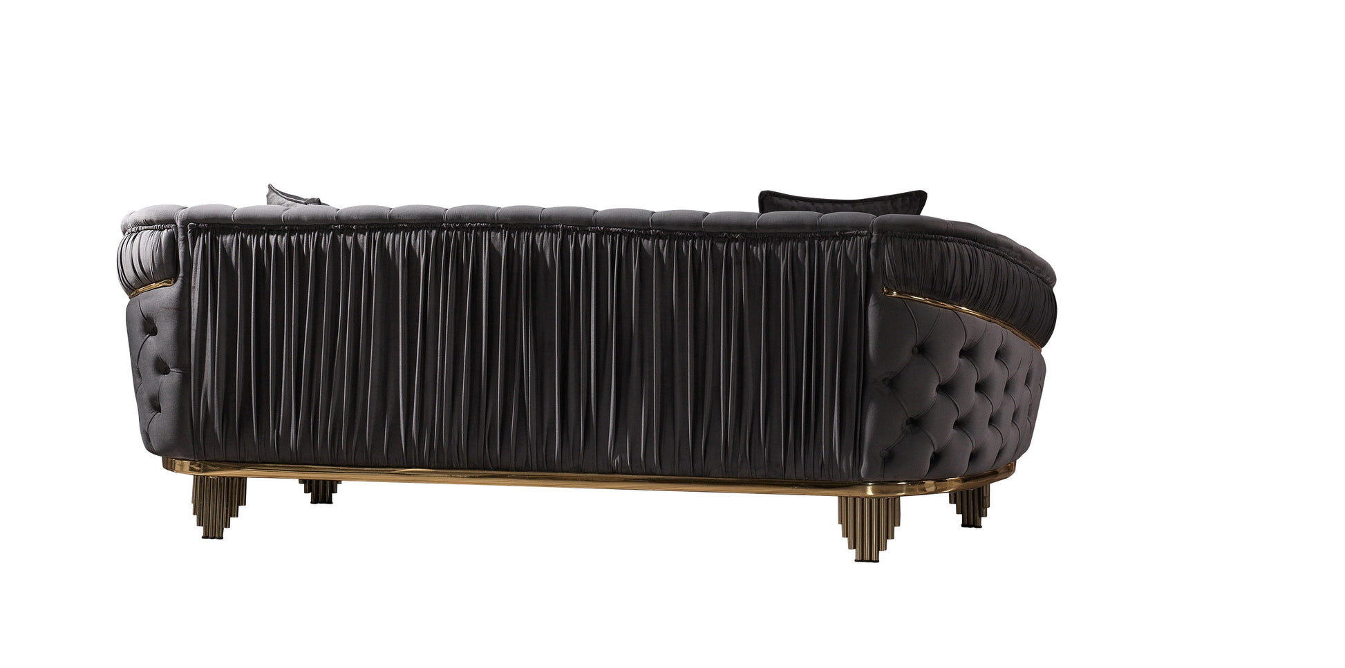 Black tufted velvet sofa with pleated side detail and gold accents