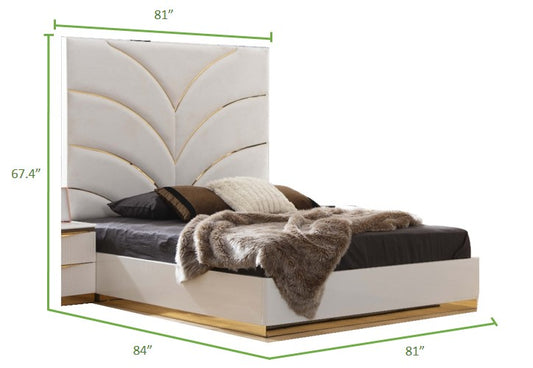 Modern white velvet king bed with gold trim and plush throws  width