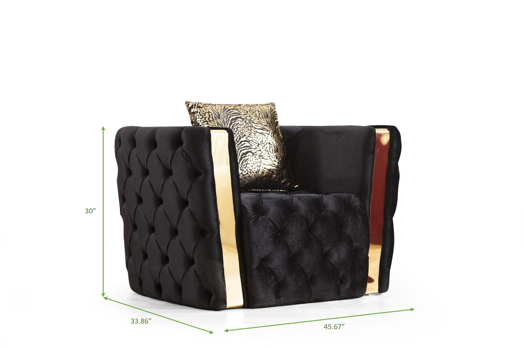 Black tufted velvet armchair with gold trim and animal print pillow