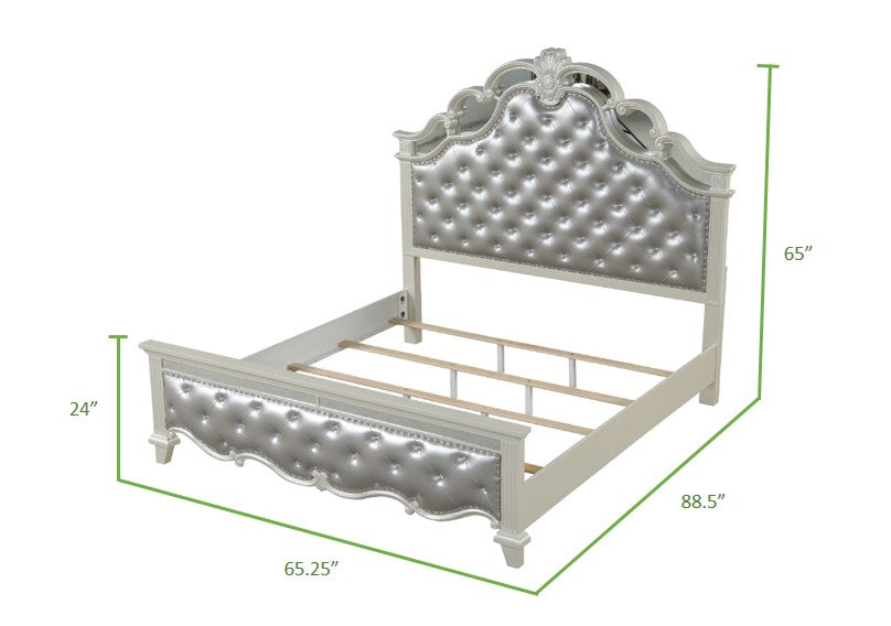 White tufted silver upholstered queen bed frame with ornate headboard