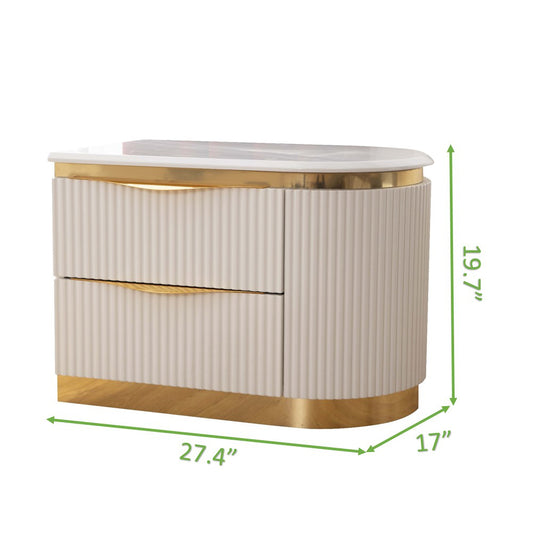 Modern nightstand with fluted cream drawers and gold accents