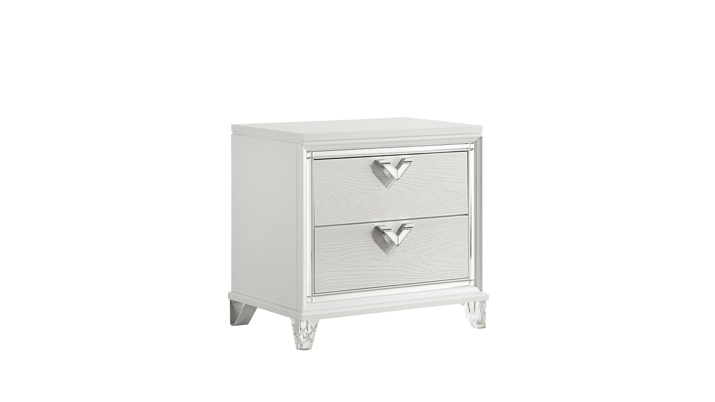 White twodrawer nightstand with textured drawer fronts and crystal legs