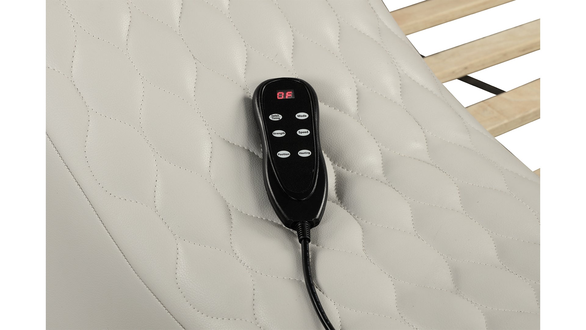 Quilted ivory faux leather upholstery with wired remote for adjustable mattress settings