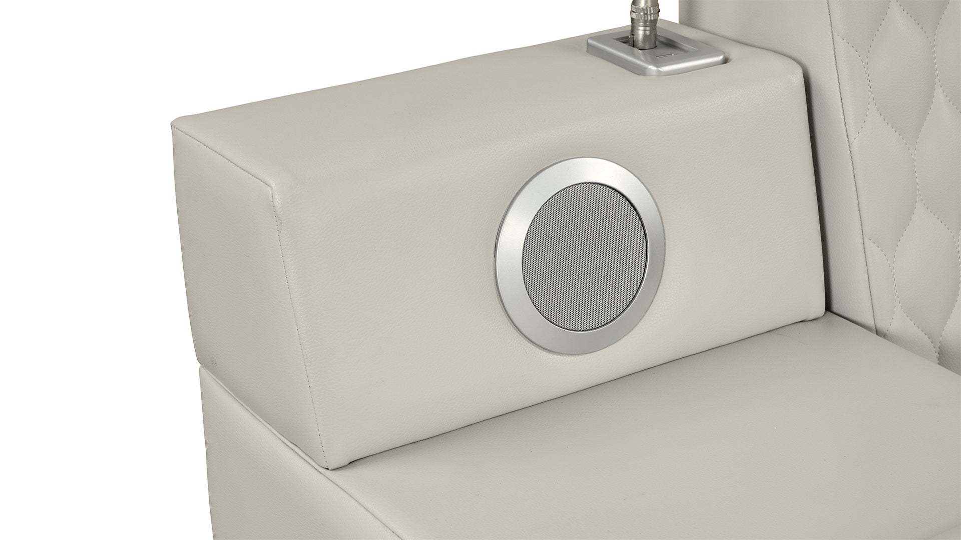 Light gray faux leather armchair armrest with integrated speaker