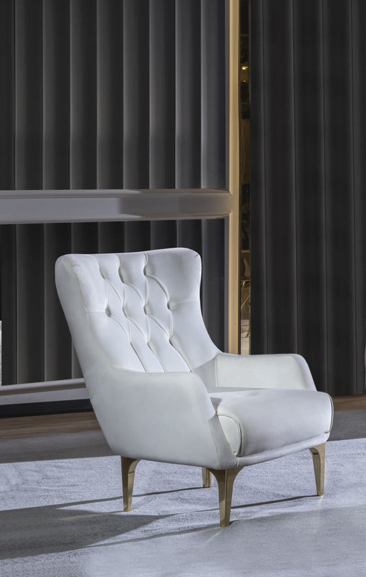 Tufted white leather accent chair with gold tapered legs and a high back