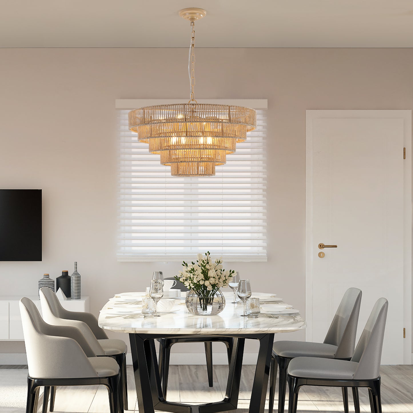 Tiered jute chandelier with warm light ideal for dining rooms and coastal decor