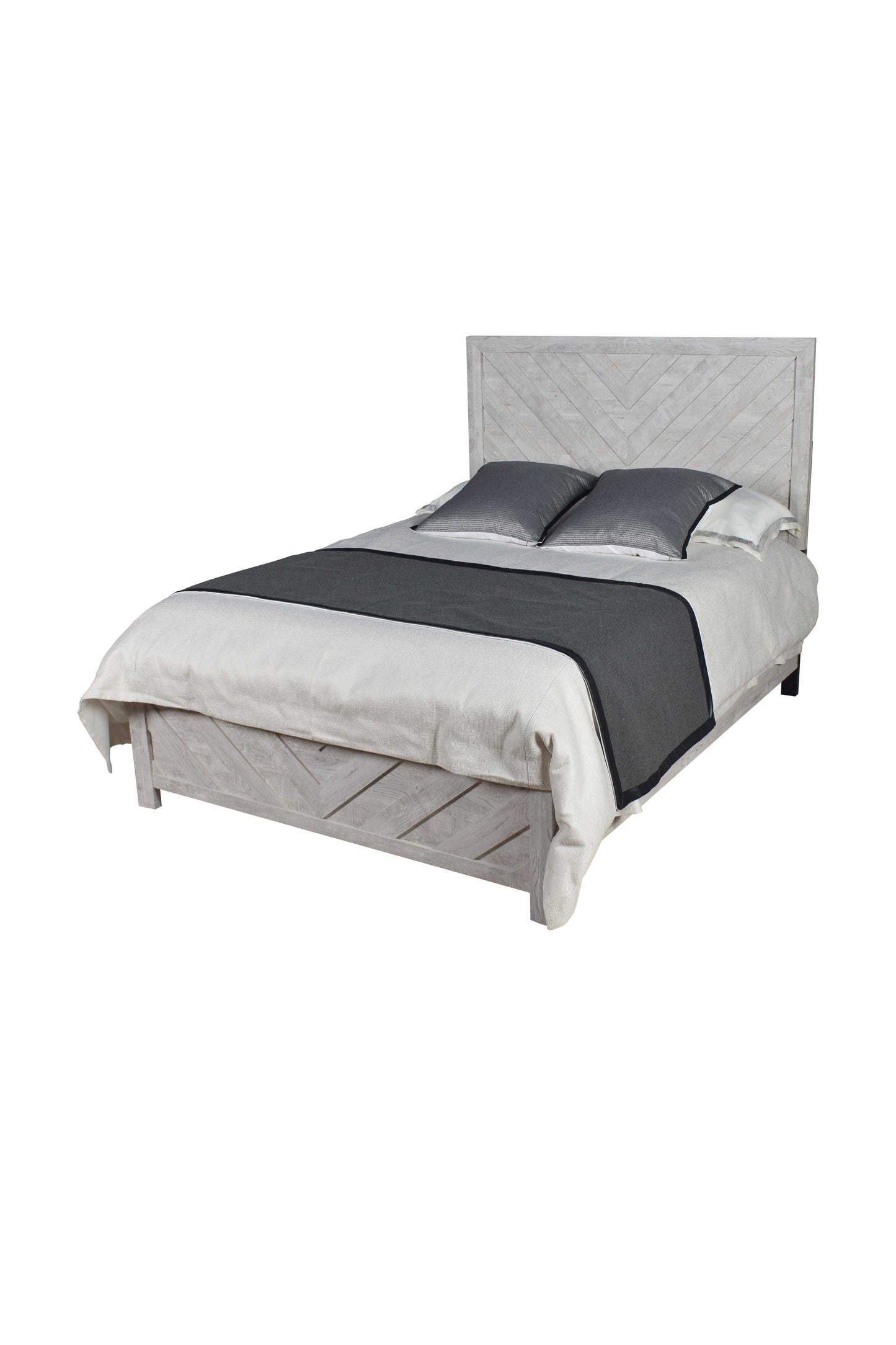 Whitewashed wood platform bed with chevron headboard and dark gray runner