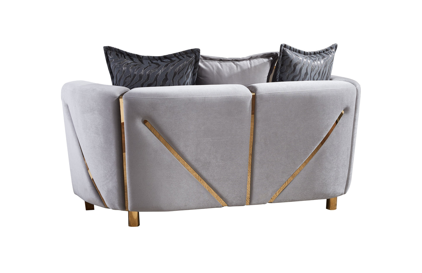 Elegant grey velvet armchair with decorative gold accents and patterned cushions