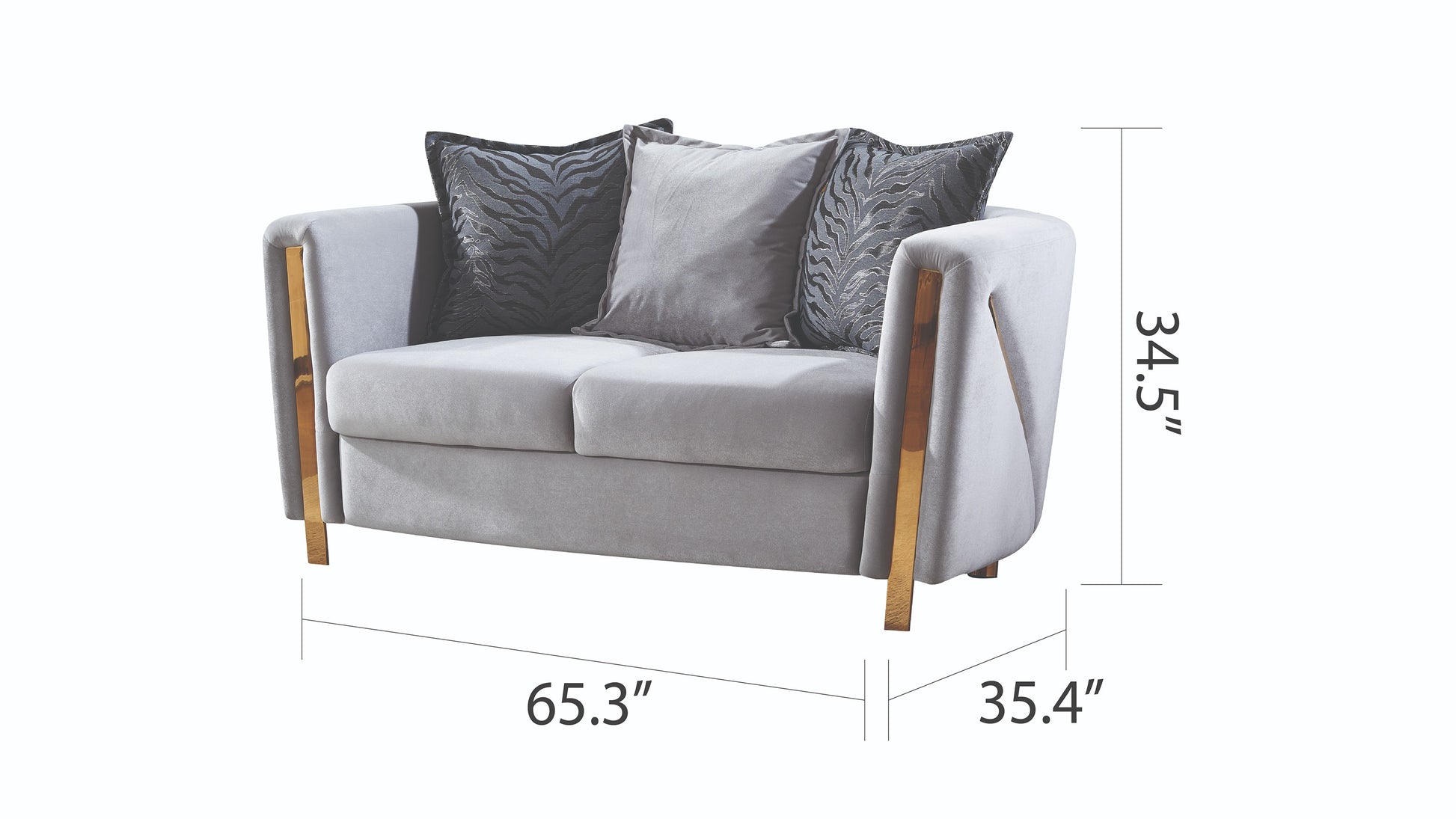 Light gray velvet loveseat with gold metal accents and decorative pillows