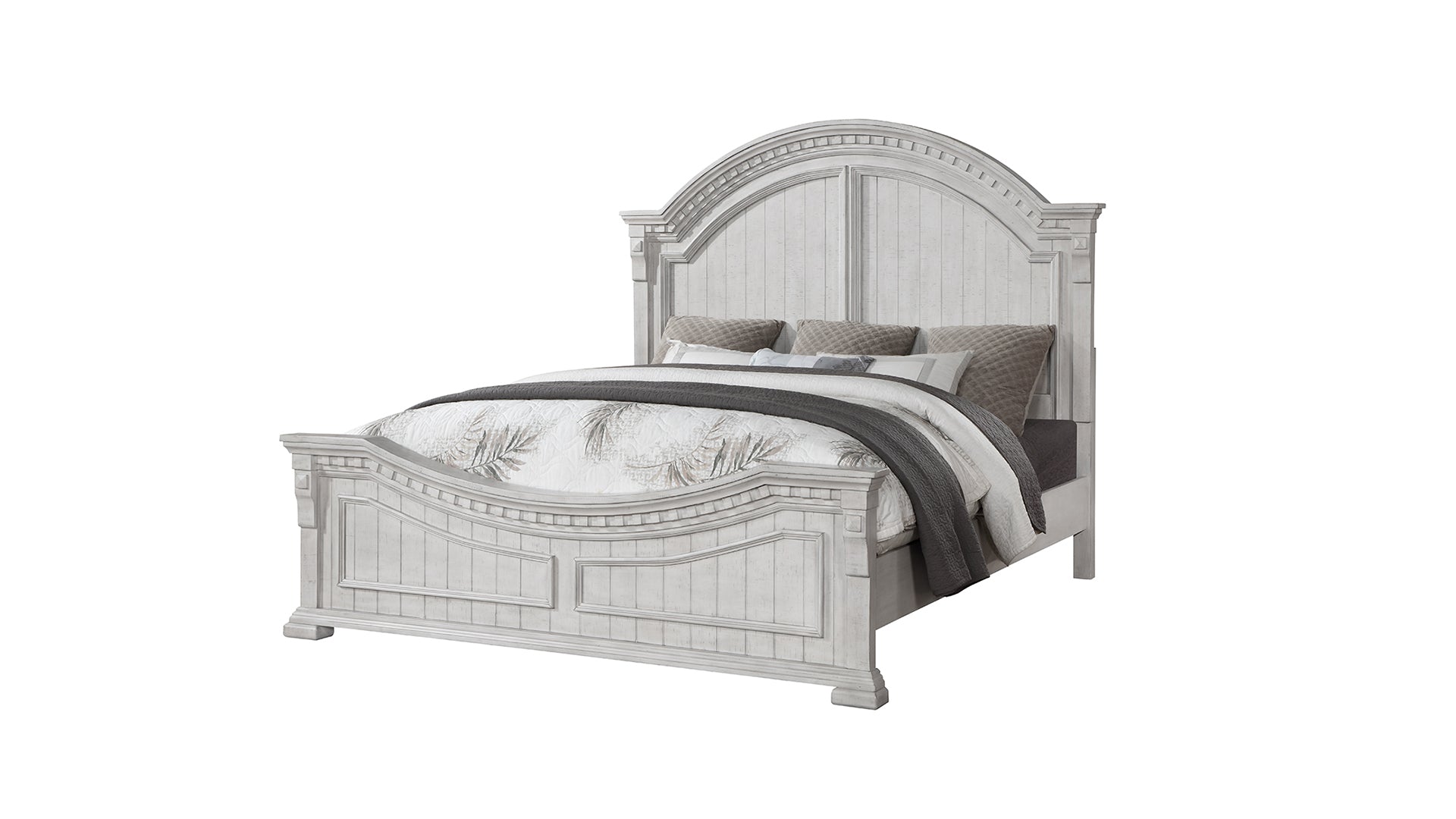 White distressed wooden king size bed with upholstered headboard and layered bedding