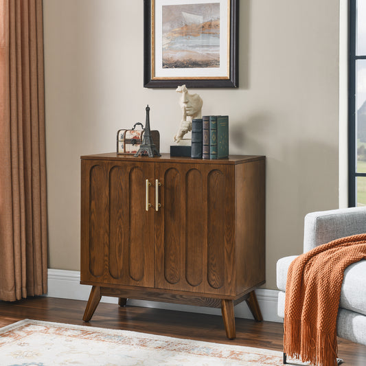 Midcentury modern walnut accent cabinet with arched door panels and brass hardware