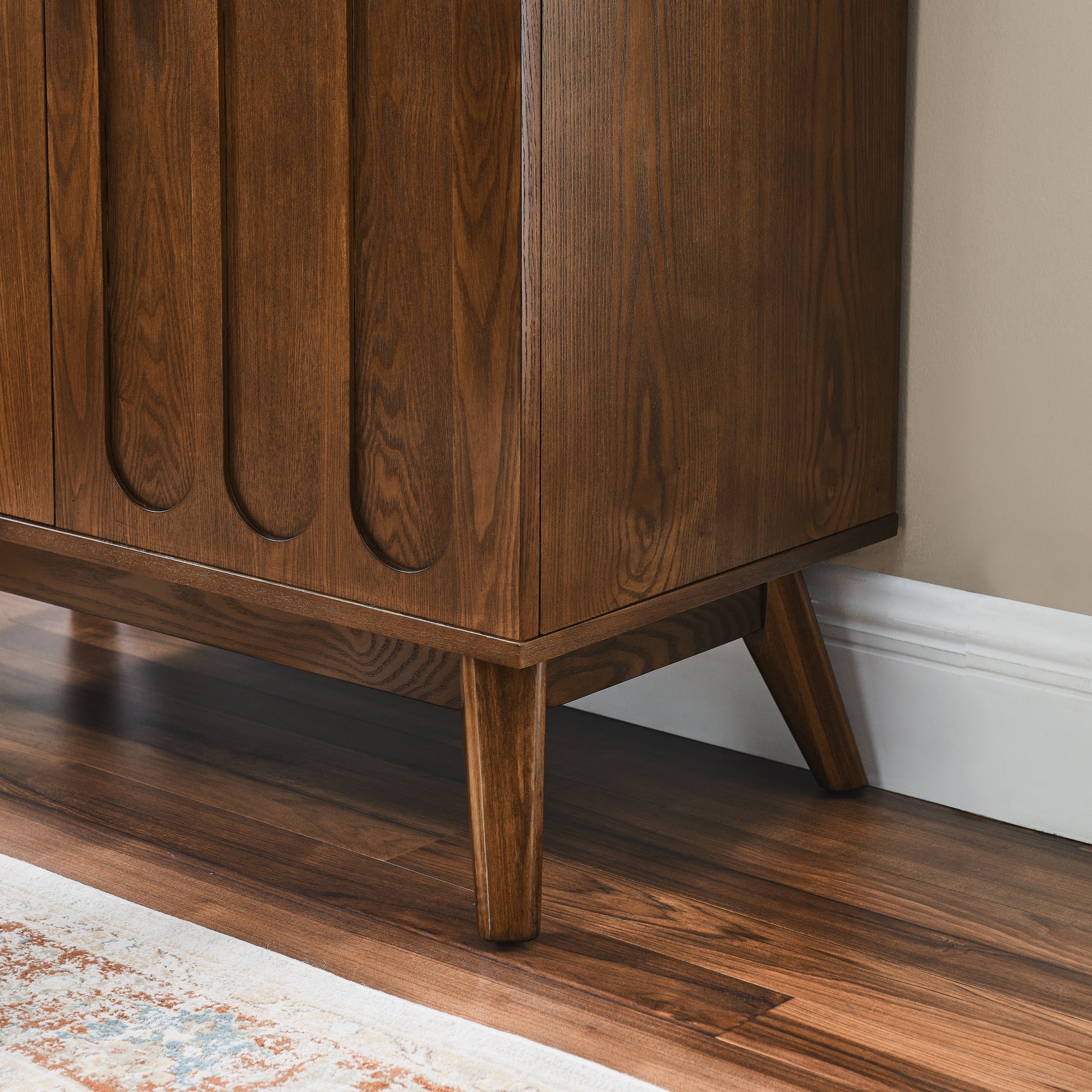 Dark walnut midcentury modern sideboard with fluted detail elegant wood grain