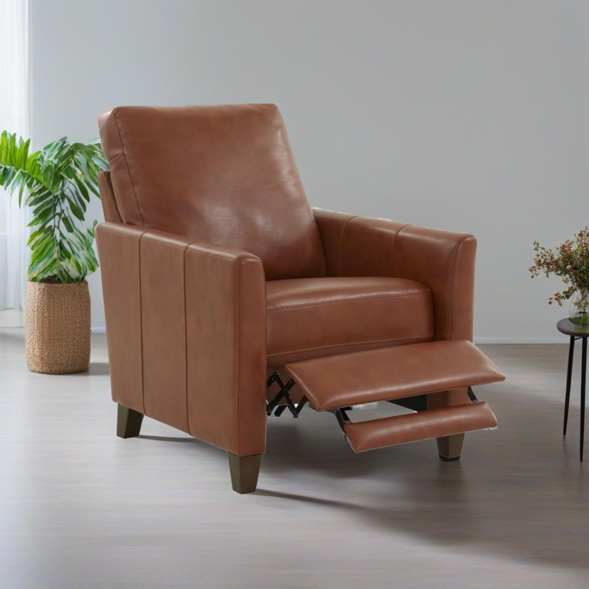 Luxurious brown leather recliner chair with extended footrest classic design