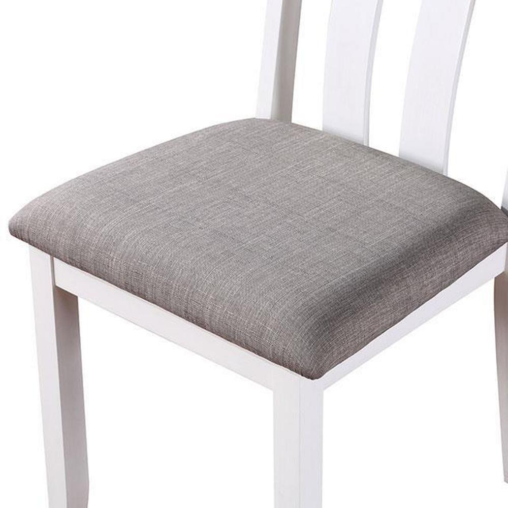 White wooden dining chair with a textured grey fabric seat cushion