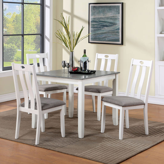 White dining chairs with grey upholstered seats around a square table