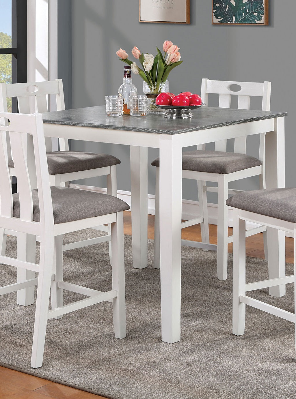 White counter height dining set with grey upholstered stools and slatelook tabletop